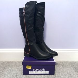 Woman’s Tall Black Boots